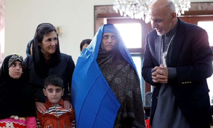 `Afghan girl` welcomed home by president: `She represents our hope` 